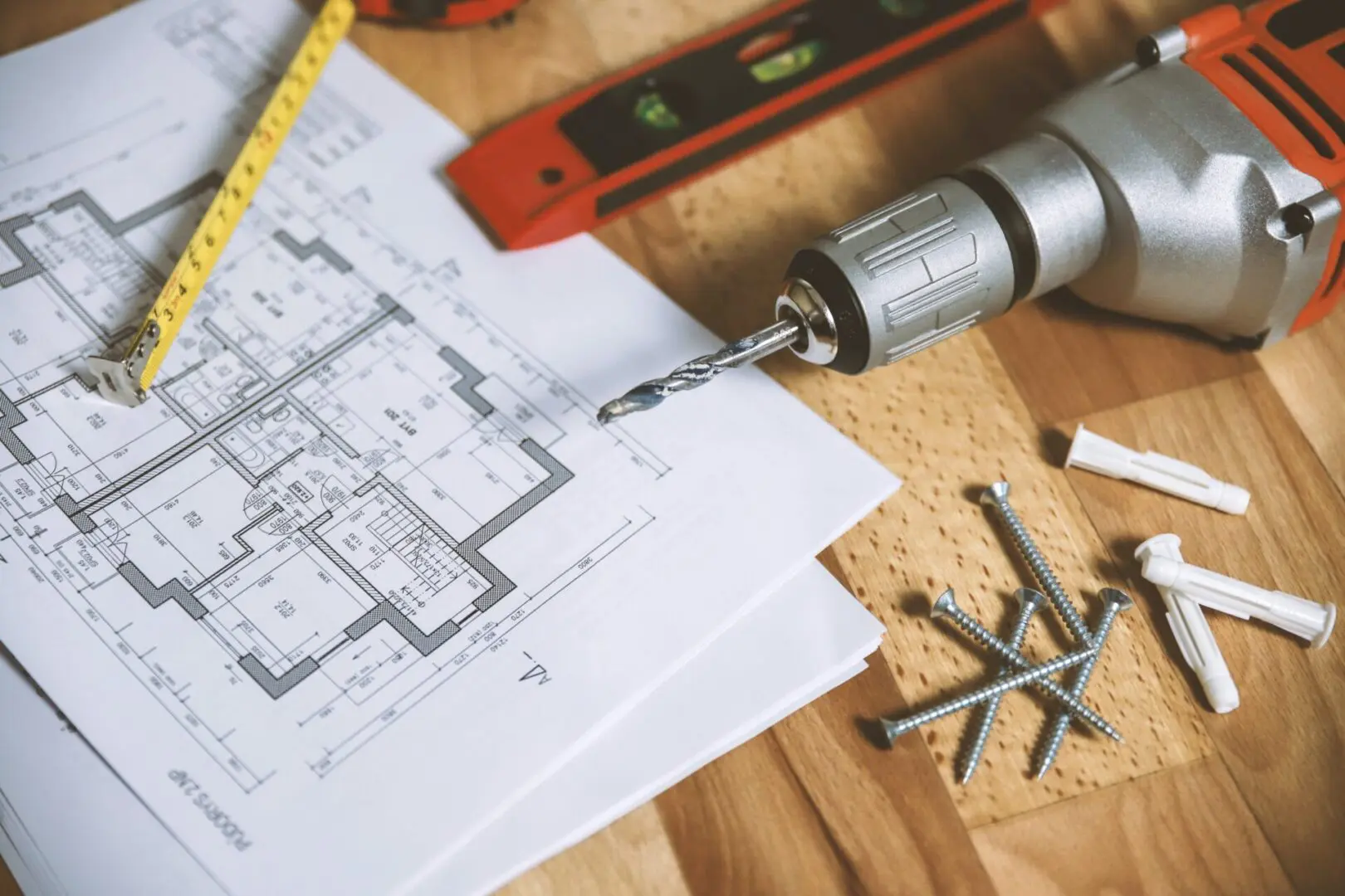 A close up of some construction tools on top of a table